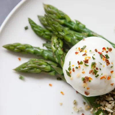 Asparagus with Poached Eggs and Herb & Garlic Breadcrumbs