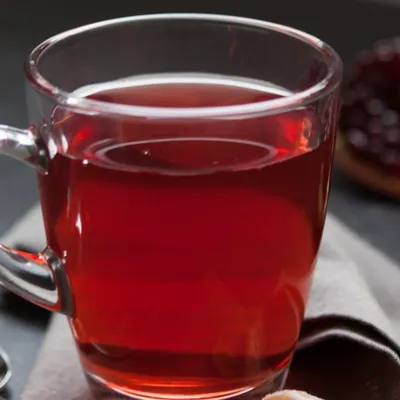 Mulled Cranapple Juice with Crystallized Ginger